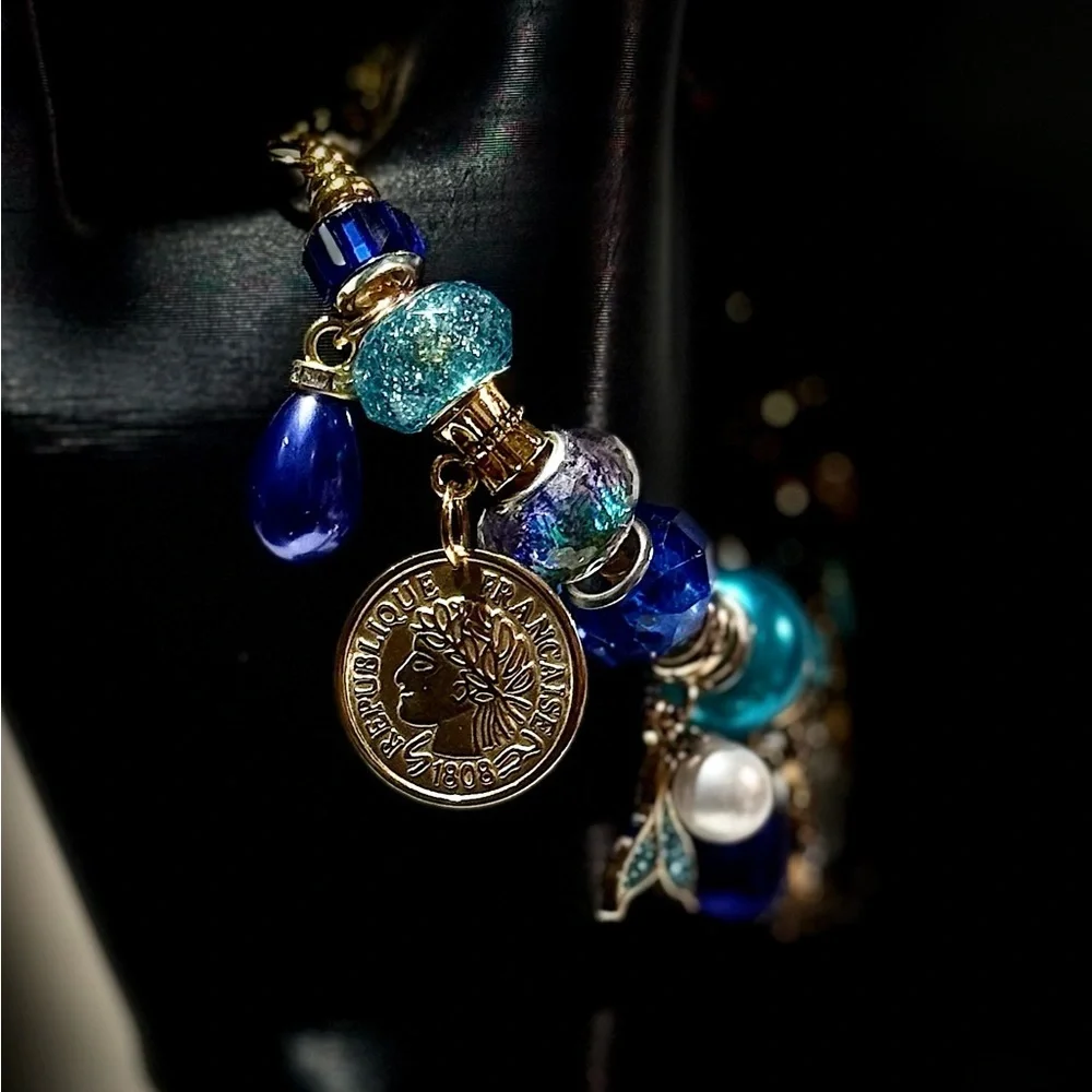 Elegant Blue and Gold Charm Bracelet